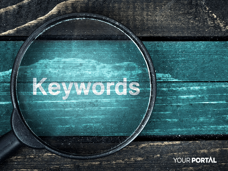 Magnifying glass over "Keywords" showing focus on mortgage SEO