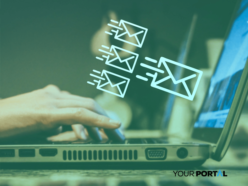 Person sending personalized marketing emails using AI automation on a laptop